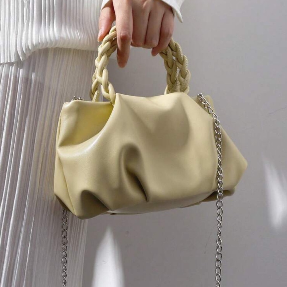 Pleated creamy yellow bag